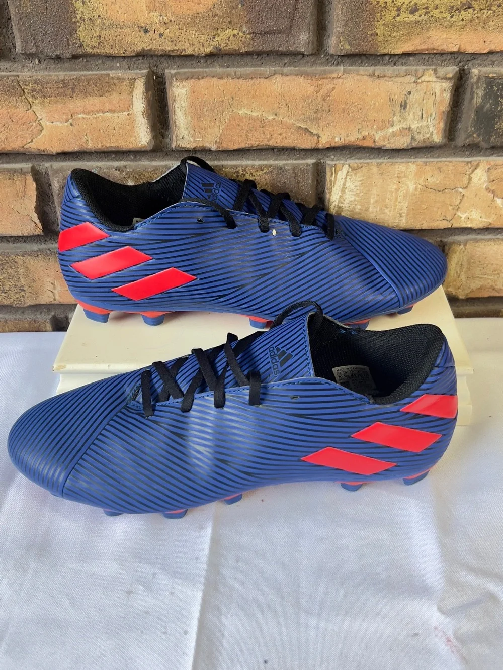 adidas Men’s Blue Soccer Cleats with Red Accents